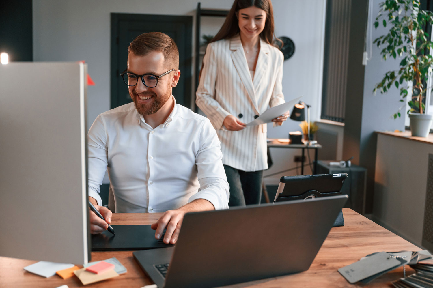 designers-are-talking-and-working-two-employees-a-2025-03-18-20-26-14-utc1